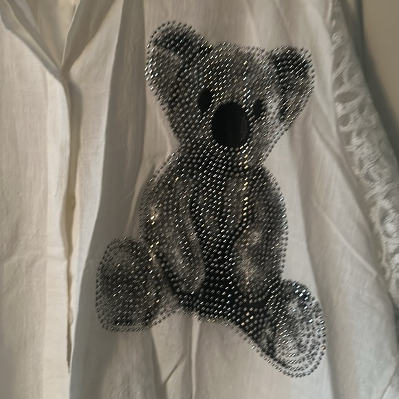 Classic white shirt with a twist…lace sleeves and across back at shoulders. - Picture 3 of 4